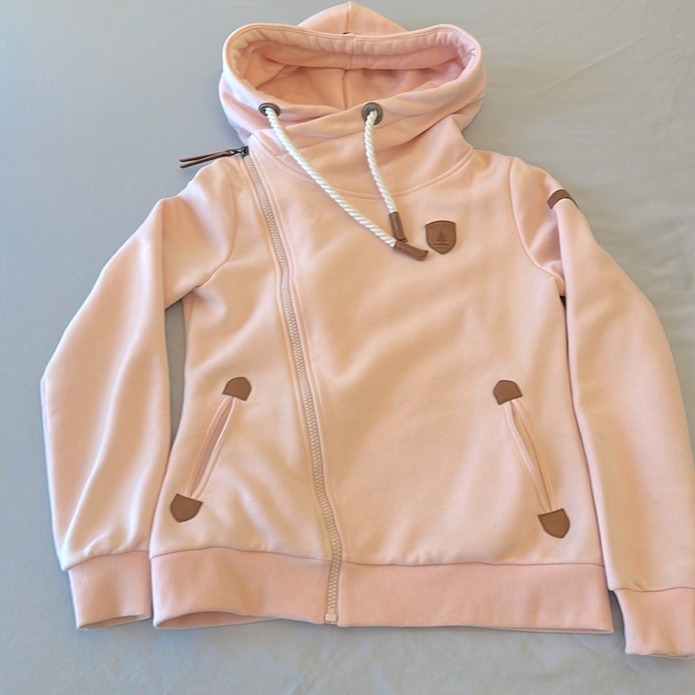 Only worn a few times. Has some very faint splatter stains on front.